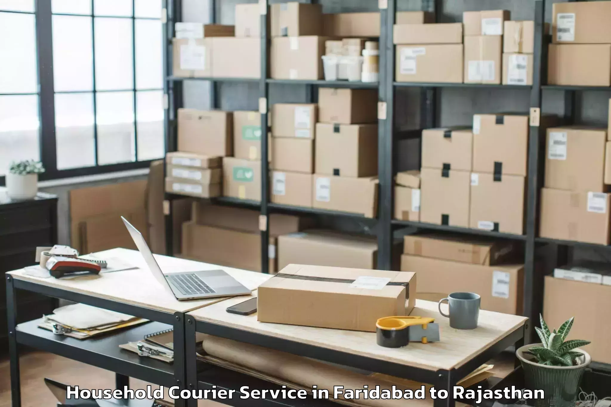 Book Your Faridabad to Bilara Household Courier Today